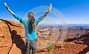 Woman Enjoys Scenic Overlook from Canyonlands' Island in the Sky