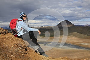 Woman enjoys stunning views of Icelandic landscape