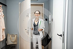 Woman entering the apartment