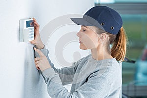 Woman entering pin code