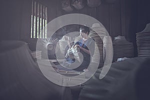 Woman In Ethnic Traditional Folks National Thai Costume Weaving hats.