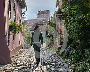 Woman on European cobblestone street