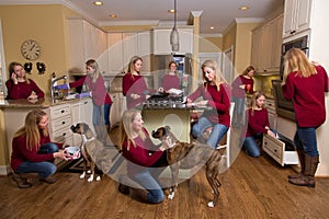Woman everywhere in kitchen photo