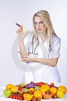 Woman examined many fruits