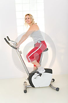 Woman on exercise bike