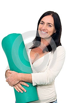 Woman with an exercise matt photo