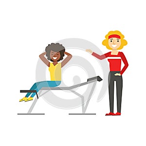 Woman Exercising Abs With Help Of Personal Trainer, Member Of The Fitness Club Working Out And Exercising In Trendy