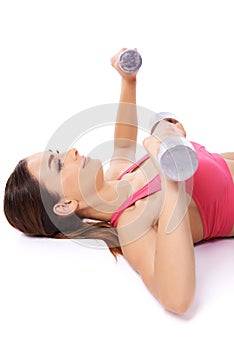 Woman exercising with barbells photo