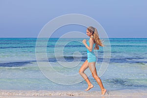 Woman exercising on beach seashore