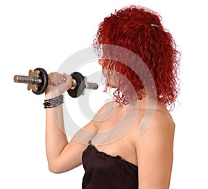 Woman exercising with dumbbell