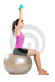 Woman Exercising With Dumbbells