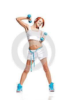 Woman exercising with dumbbells