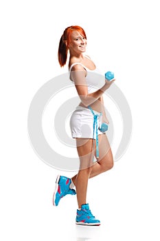 Woman exercising with dumbbells