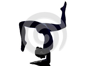 woman exercising Eka Pada Viparita Dandasana pose yoga silhouett