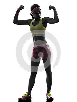 Woman exercising fitness flexing muscles silhouette