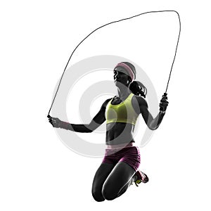 Woman exercising fitness jumping rope silhouette