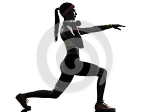 Woman exercising fitness lunges workout silhouette