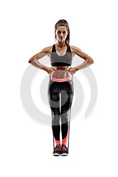 Woman exercising fitness resistance bands in studio silhouette isolated on white background