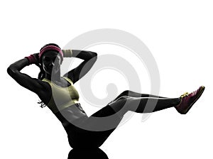 Woman exercising fitness workout crunches silhouette