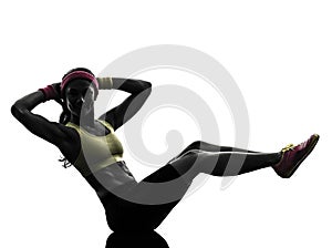 Woman exercising fitness workout crunches silhouette photo