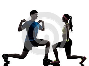 Woman exercising fitness workout with man coach