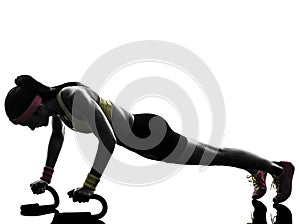 Woman exercising fitness workout push ups silhouette