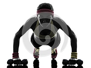 Woman exercising fitness workout push ups silhouette