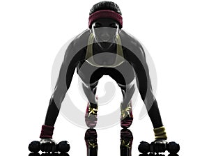 Woman exercising fitness workout push ups silhouette