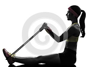 Woman exercising fitness workout resistance bands silhouette