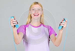 Woman exercising with jumping rope. Jumping exercise benefits. Get ready summer body. Slim down. Fit and healthy. Weight