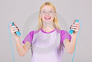 Woman exercising with jumping rope. Jumping exercise benefits. Get ready summer body. Slim down. Fit and healthy. Weight