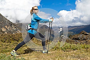 Woman exercising in mountains