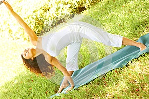 Woman Exercising In Park