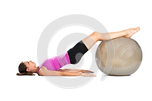 Woman Exercising With Pilate Ball