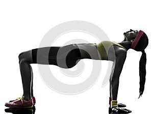 Woman exercising plank position fitness workout silhouette