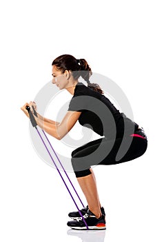 Woman exercising with a resistance rope