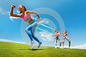 Woman exercising resistance rubber band