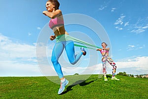 Woman exercising resistance rubber band
