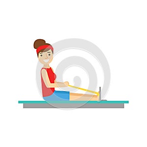 Woman Exercising On Rowing Simulator, Member Of The Fitness Club Working Out And Exercising In Trendy Sportswear