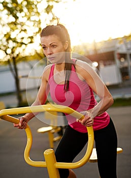 Woman exercising on a stationary bike.