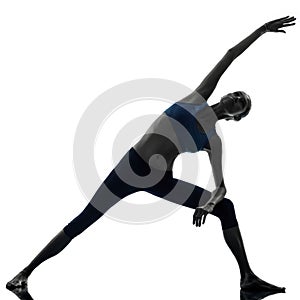 Woman exercising stretching triangle pose yoga