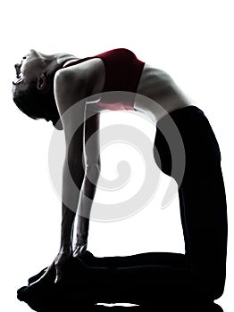 Woman exercising yoga camel pose