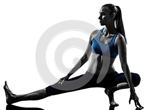 Woman exercising yoga stretching legs warm up