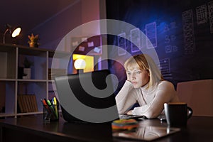 Woman exhausted while working overtime