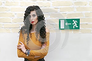 Woman at the exit sign