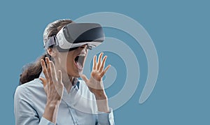 Woman experiencing virtual reality photo