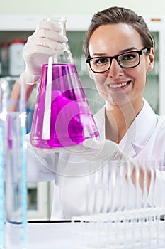 Woman experimenting in laboratory