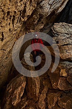 Woman explorer in a cave