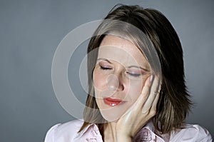 Woman expressing dental pain