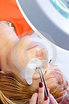 Woman eyelash extension